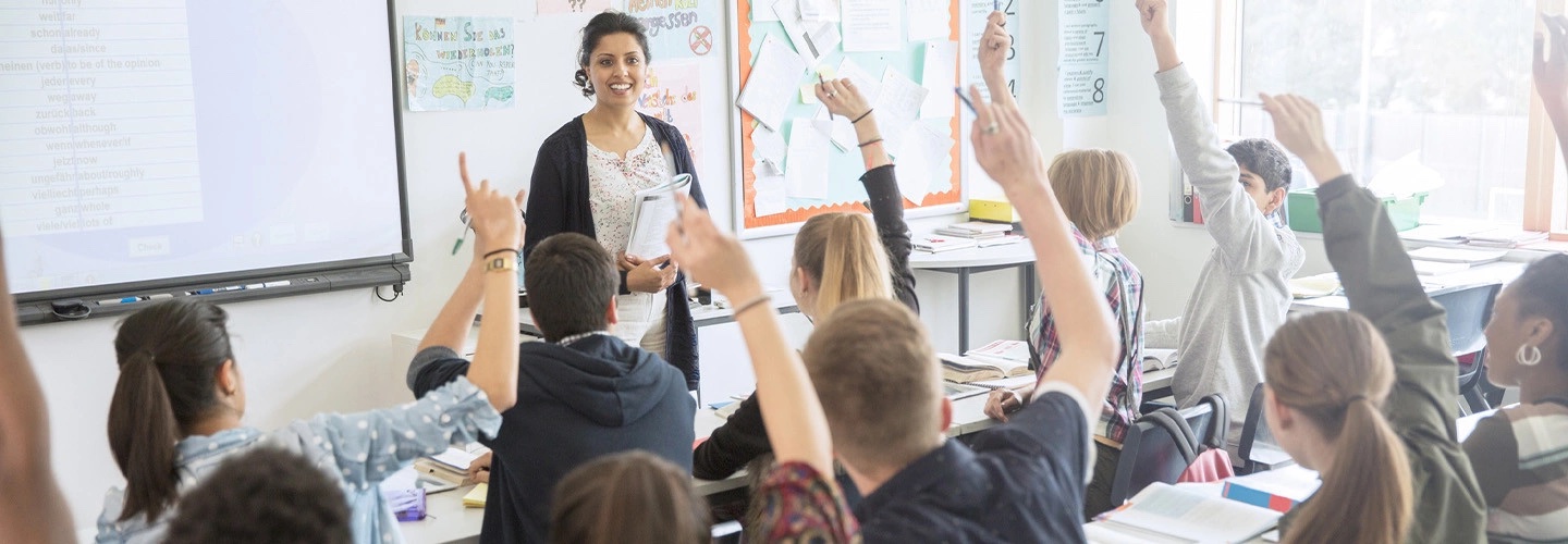 Students raising their hands