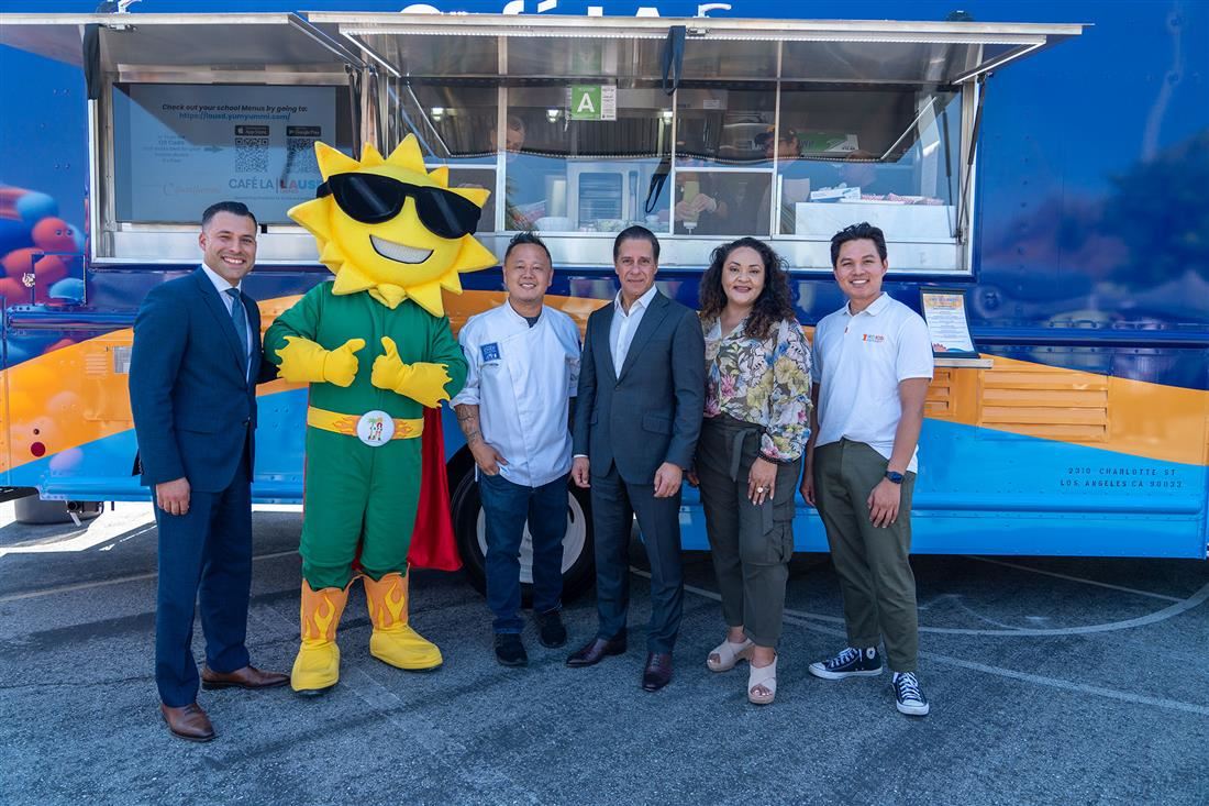 Group photo in front of new food truck