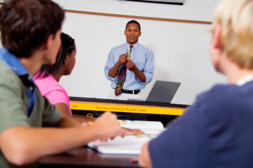 Teacher talking to students 