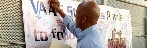 Ronnie Lott signs the #DigCitLA banner to pledge his support 