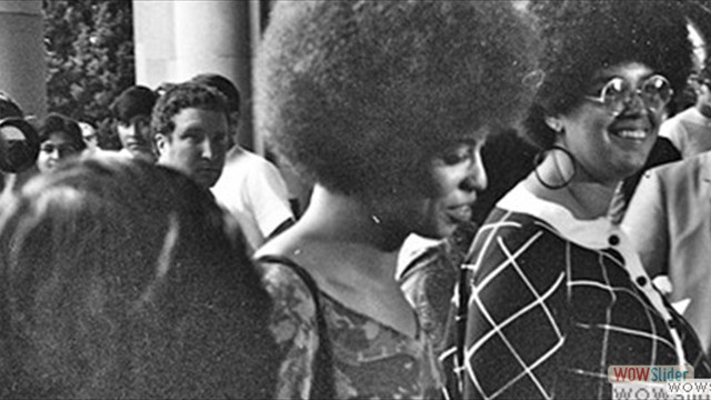 Angela Davis enters Royce Hall for first lecture
